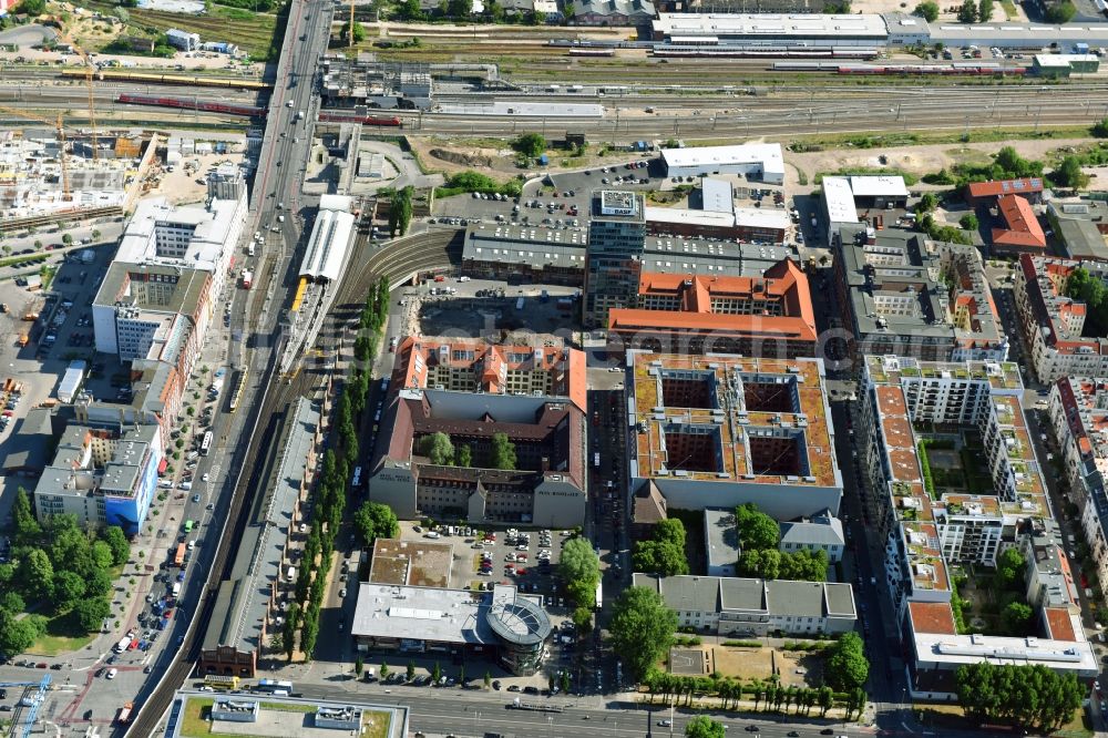 Berlin from the bird's eye view: View at the restored building of the monument protected former Osram respectively Narva company premises Oberbaum City in the district Friedrichshain in Berlin. Here, among many other companies, BASF Services Europe, the German Post Customer Service Center GmbH and Heineken Germany GmbH are located. It is owned by HVB Immobilien AG, which is part of the UniCredit Group