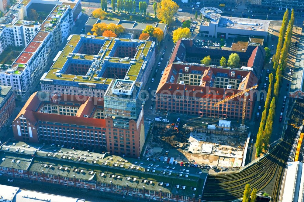 Aerial image Berlin - View at the restored building of the monument protected former Osram respectively Narva company premises Oberbaum City in the district Friedrichshain in Berlin. Here, among many other companies, BASF Services Europe, the German Post Customer Service Center GmbH and Heineken Germany GmbH are located. It is owned by HVB Immobilien AG, which is part of the UniCredit Group