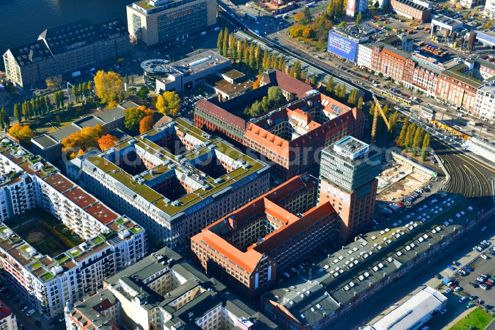 Berlin from the bird's eye view: View at the restored building of the monument protected former Osram respectively Narva company premises Oberbaum City in the district Friedrichshain in Berlin. Here, among many other companies, BASF Services Europe, the German Post Customer Service Center GmbH and Heineken Germany GmbH are located. It is owned by HVB Immobilien AG, which is part of the UniCredit Group