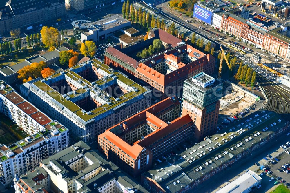 Berlin from above - View at the restored building of the monument protected former Osram respectively Narva company premises Oberbaum City in the district Friedrichshain in Berlin. Here, among many other companies, BASF Services Europe, the German Post Customer Service Center GmbH and Heineken Germany GmbH are located. It is owned by HVB Immobilien AG, which is part of the UniCredit Group