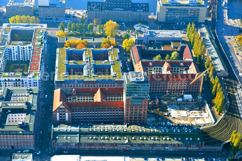 Berlin from the bird's eye view: View at the restored building of the monument protected former Osram respectively Narva company premises Oberbaum City in the district Friedrichshain in Berlin. Here, among many other companies, BASF Services Europe, the German Post Customer Service Center GmbH and Heineken Germany GmbH are located. It is owned by HVB Immobilien AG, which is part of the UniCredit Group