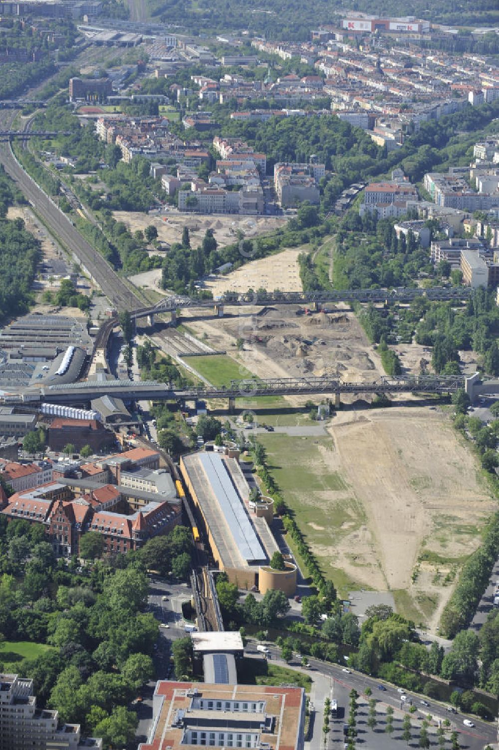 Berlin from above - Look at the underground train station Gleisdreieck. The railroad lines U1 and U2 are crossing each other at this overground station