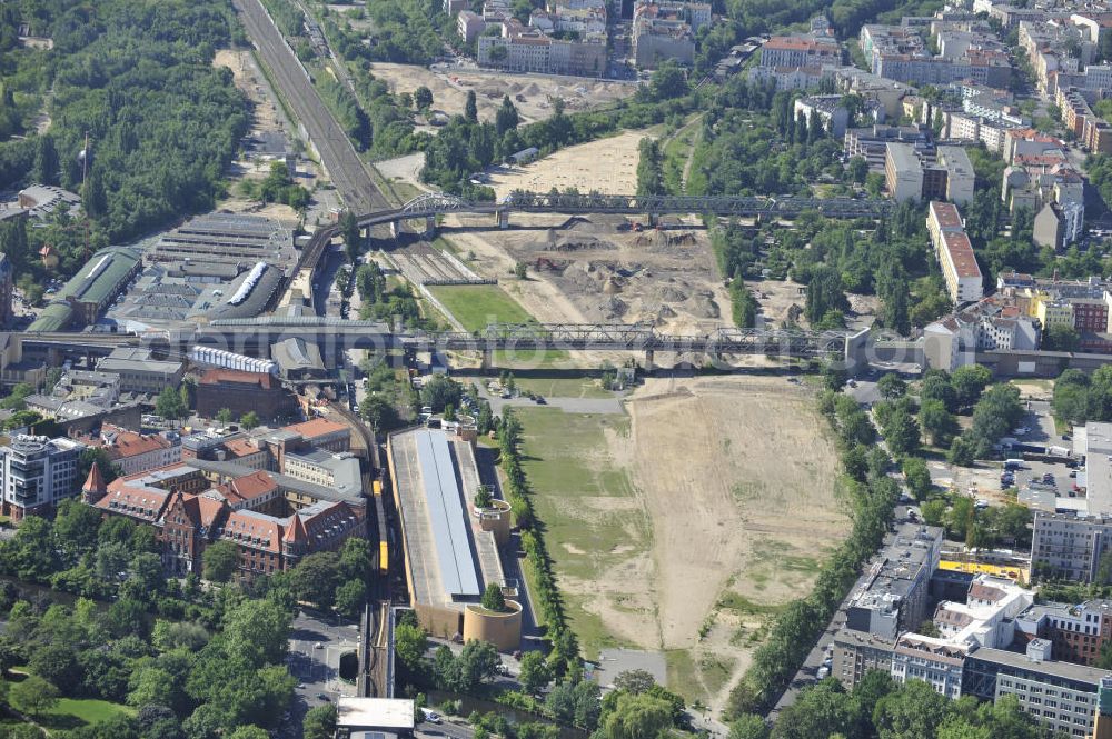 Aerial image Berlin - Look at the underground train station Gleisdreieck. The railroad lines U1 and U2 are crossing each other at this overground station