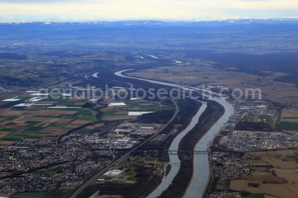 Neuenburg am Rhein from above - Border area to France at the Upper-Rhine at Neuenburg Rhine in the state Baden-Wuerttemberg. Looking southbound over the river Rhine and canal towards Basle