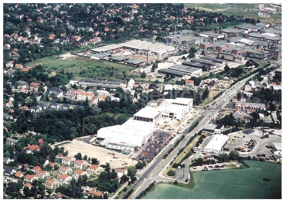 Aerial image Berlin - Mahlsdorf - OBI-Baumarkt an der B1 in Berlin - Mahlsdorf und Baustellen zur Errichtung versch. Gewerbeeinheiten.