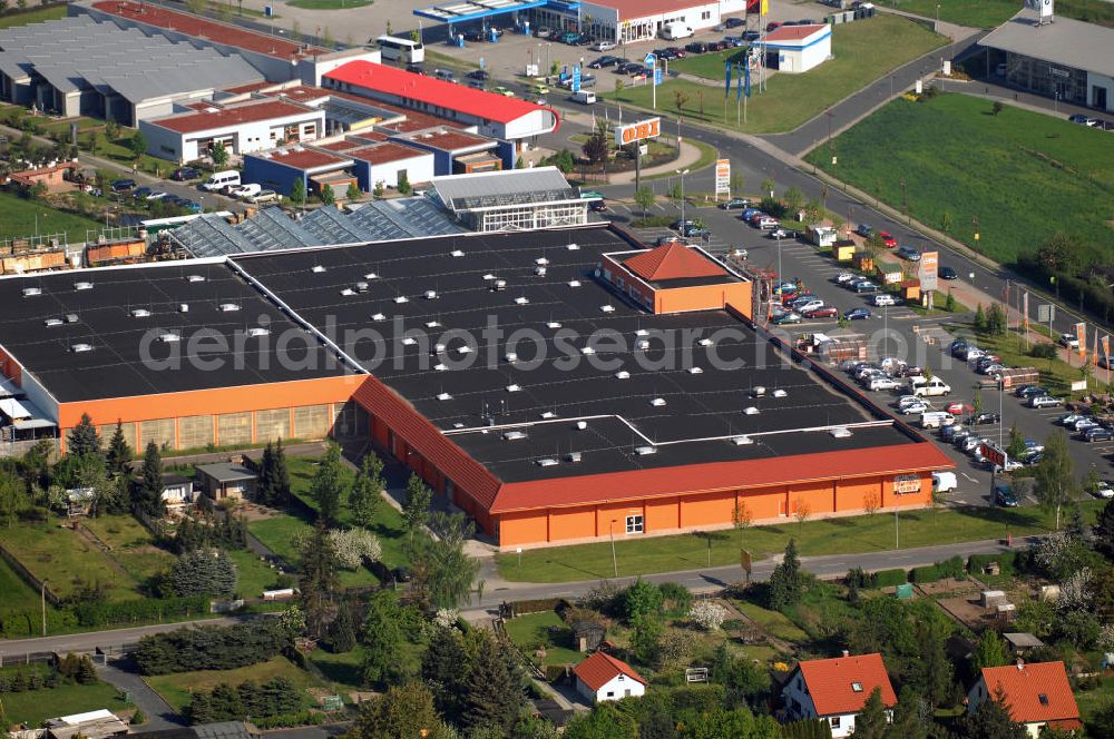 Grimma from above - Blick auf den OBI Baumarkt in Grimma. Der Baumarkt hat eine vielseitige Auswahl in den Bereichen Eisenwaren/ Maschinen, Farben/ Dekoration, Holz/ Bauen, Sanitär/ Fliesen, Elektro/ Leuchten, Haushalt/ Ordnung, Garten. Kontakt: OBI Baumarkt Grimma, Hengstbergstr. 2, 04668 Grimma, Tel. +49(0)3437 92530 0, Fax +49(0)3437 92530 30,