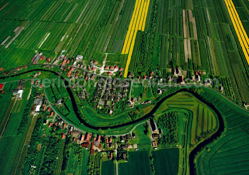 Guderhandviertel from above - Fruit-growing region Altes Land (Old Land) in the borough of Guderhandviertel in the state of Lower Saxony. The region is one of the largest fruit growing regions of Europe. The river Luehe takes its course between hamlets, villages and fields