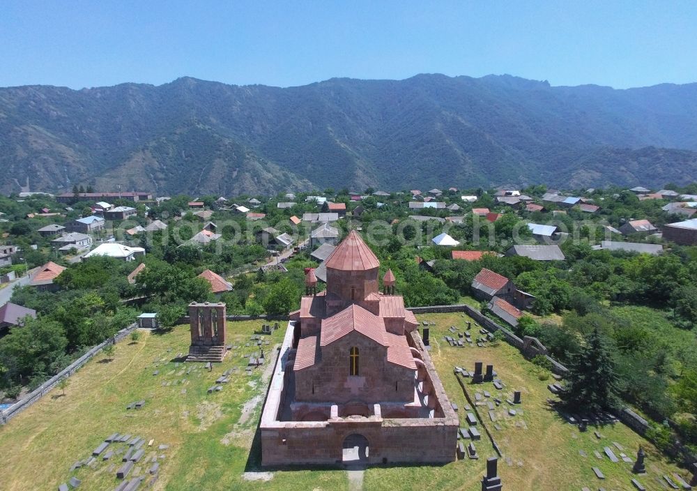 Aerial image Odzun - View of the Odzun Cathedral on the monastery street in Odzun, Lori Province, Armenia