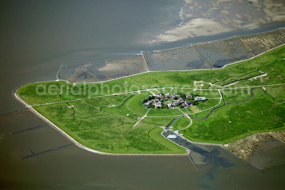 Oland from above - Oland is a small hallig which is connected by a narrow gauge railway to the mainland and to hallig Langeneß. Germany's smallest lighthouse is located here, being also the only one with a thatched roof