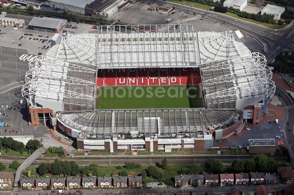 Manchester from above - Blick auf das Stadion Old Trafford. Es ist die Heimspielstätte des Fußballvereins Manchester United. Das Stadion ist das zweitgrößte Englands und wird auch Theatre of Dreams genannt. View of the Old Trafford stadium. It is the home ground of the football club Manchester United. The stadium is the second largest in England and is also called Theatre of Dreams .