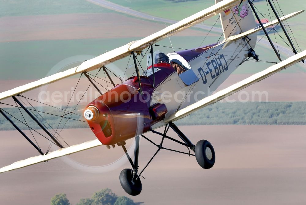 Aerial photograph Kirchheim unter Teck - Vintage plane - biplane over the airfield Hahnweide in Kirchheim unter Teck in Baden-Wuerttemberg