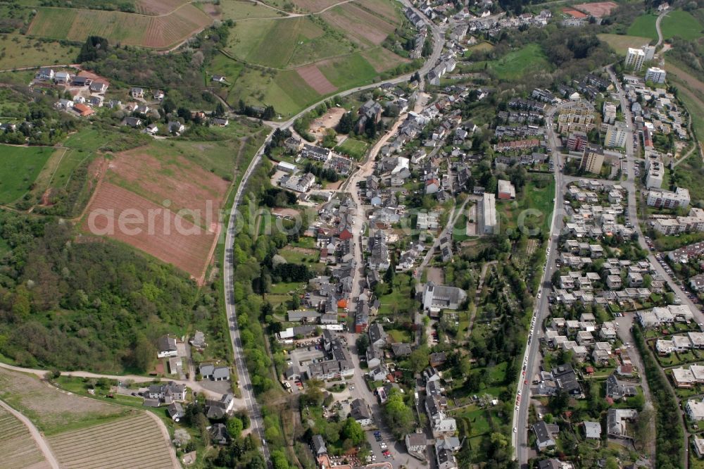 Aerial photograph Trier - View on the village Olewig. The district lies in the valley Olewiger. Hilly residential area with single-family and multi-family homes that have been built partly on a slope. The district is located in Trier in Rhineland-Palatinate