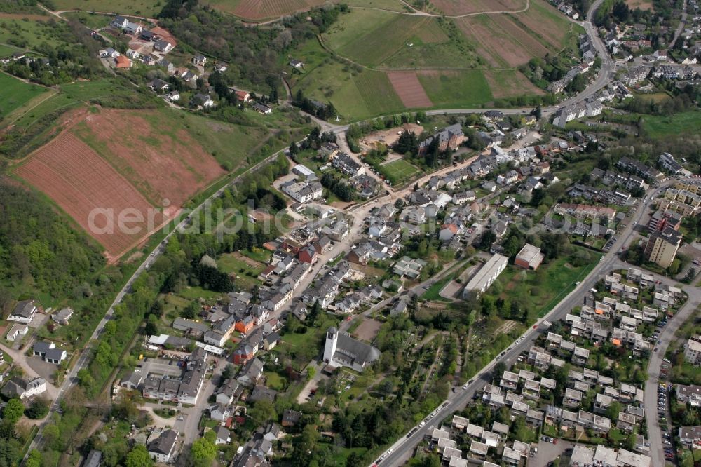 Trier from above - View on the village Olewig. The district lies in the valley Olewiger. Hilly residential area with single-family and multi-family homes that have been built partly on a slope. The district is located in Trier in Rhineland-Palatinate