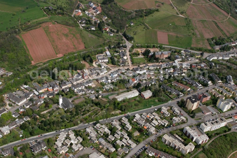 Trier from the bird's eye view: View on the village Olewig. The district lies in the valley Olewiger. Hilly residential area with single-family and multi-family homes that have been built partly on a slope. The district is located in Trier in Rhineland-Palatinate