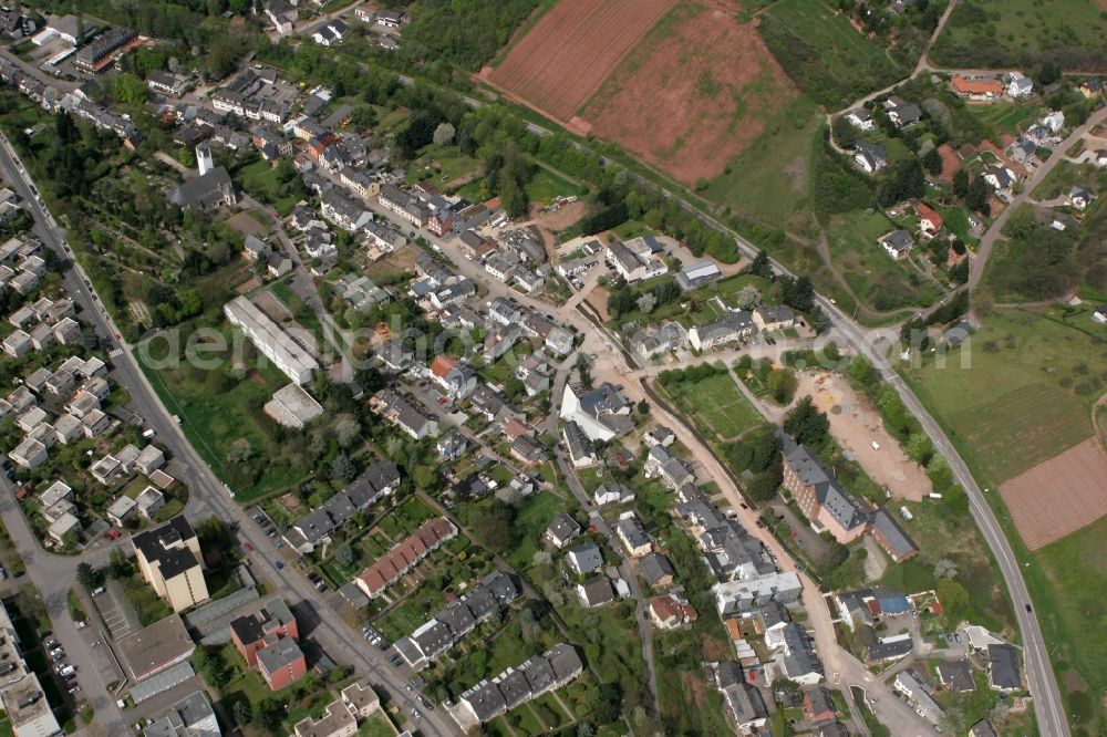 Aerial photograph Trier - View on the village Olewig. The district lies in the valley Olewiger. Hilly residential area with single-family and multi-family homes that have been built partly on a slope. The district is located in Trier in Rhineland-Palatinate