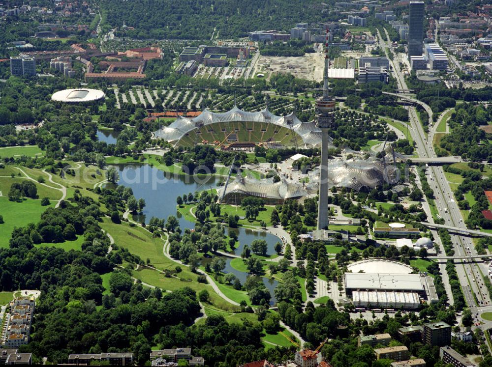 München from the bird's eye view: Blick auf den Olympiapark, welcher Austragungsort der 20. Olympischen Sommerspiele 1972 auf dem Oberwiesenfeld war, und den Fernsehturm. Bis heute finden hier Veranstaltungen jeglicher Art statt. Kontakt: Olympiapark München GmbH, Spiridon-Louis-Ring 21, 80809 München, Tel. +49(0)89 3067 0, Fax +49(0)89 3067 2222, e-mail: infoolympiapark-muenchen.de;