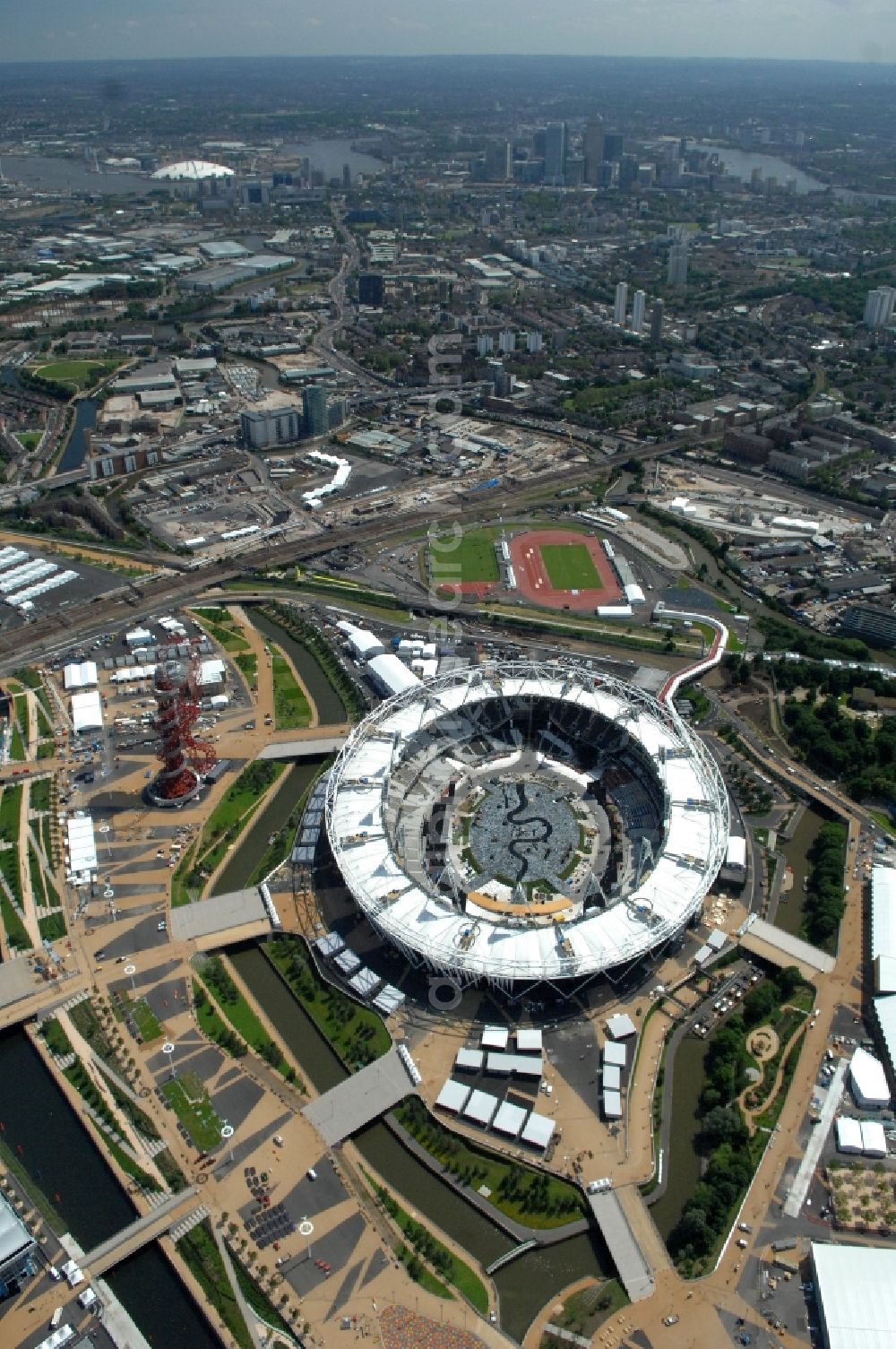 London from above - The Olympic Stadium in Olympic Park, London, England, is designed to be the centrepiece of the 2012 Summer Olympics and 2012 Summer Paralympics, and the venue of the athletic events as well as the Olympic Games opening and closing ceremonies in Great Britain