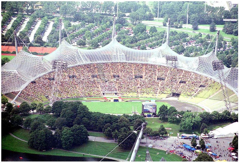 München from the bird's eye view: 25.07.2004 Blick auf das Olympiastadion in München Olympiapark München GmbH,Spiridon-Louis-Ring 21, 80809 München,Telefon:(089) 3067 - 0, e-mail: info@olympiapark-muenchen.de Nichtredaktionelle Verwendung nur nach Absprache !