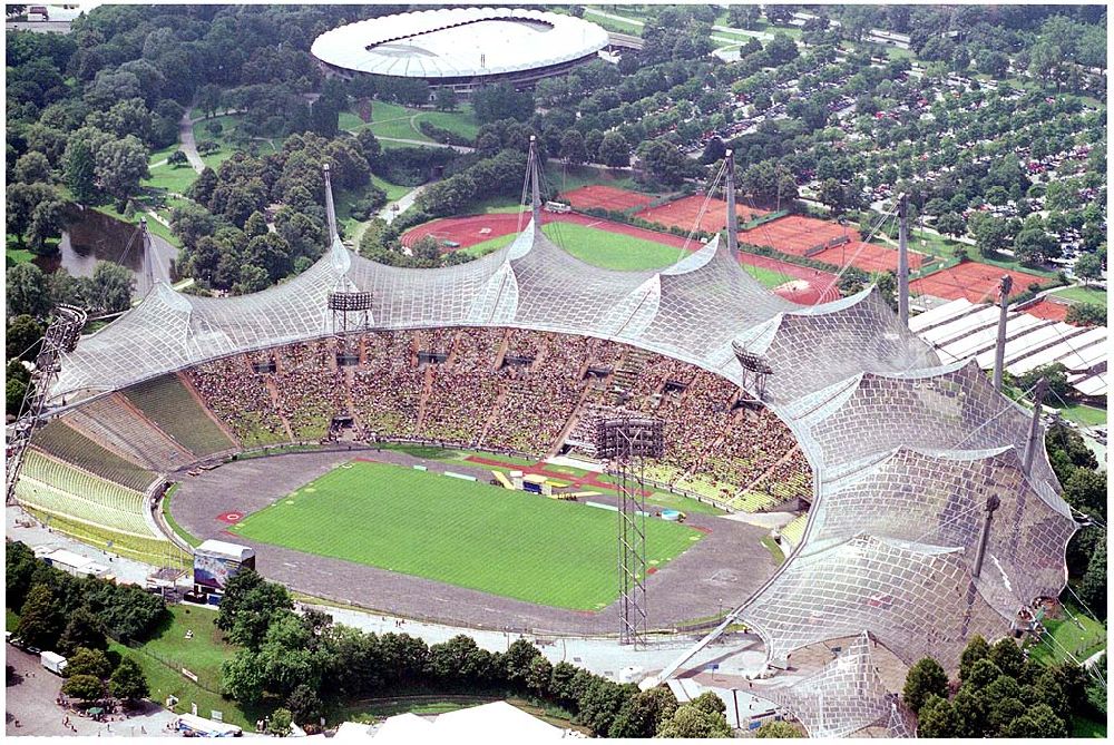 Aerial photograph München - 25.07.2004 Blick auf das Olympiastadion in München Olympiapark München GmbH,Spiridon-Louis-Ring 21, 80809 München,Telefon:(089) 3067 - 0, e-mail: info@olympiapark-muenchen.de Nichtredaktionelle Verwendung nur nach Absprache !