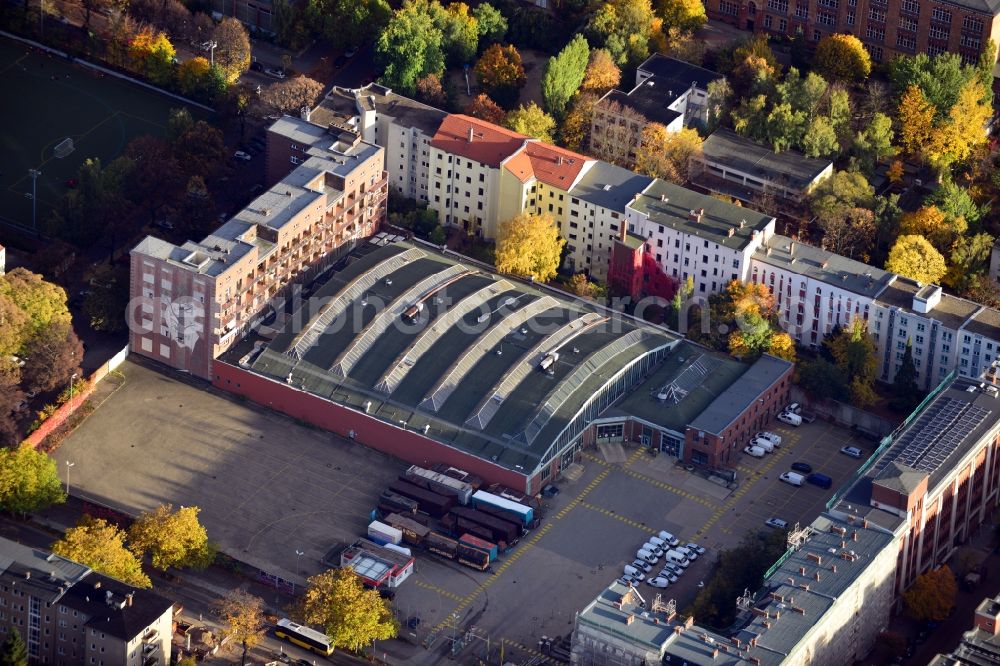 Berlin from the bird's eye view: View of a bus depot of the Berlin Transport Services ( BVG ) at Usedomer Strasse Berlin - Wedding. The petroleum company Total S.A. operates a service station on the premises