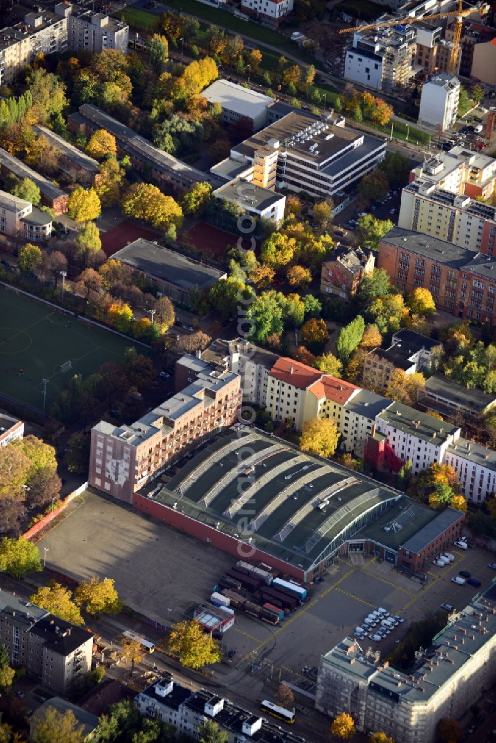 Aerial image Berlin - View of a bus depot of the Berlin Transport Services ( BVG ) at Usedomer Strasse Berlin - Wedding. The petroleum company Total S.A. operates a service station on the premises