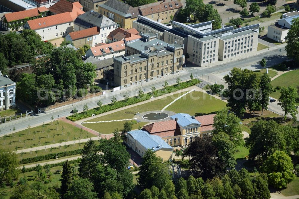 Neustrelitz from above - Orangerie in the Northeastern part of the castle park in Neustrelitz in the state of Mecklenburg - Western Pomerania. The historic building includes a restaurant and is located on the edge of the park