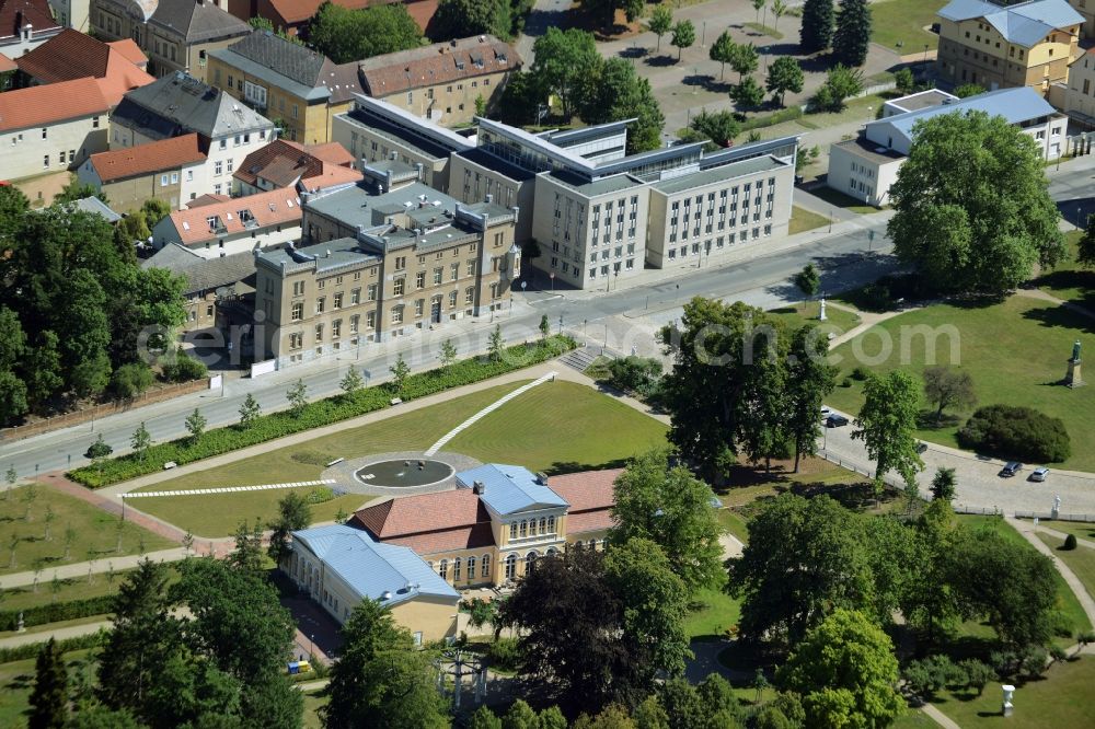 Aerial image Neustrelitz - Orangerie in the Northeastern part of the castle park in Neustrelitz in the state of Mecklenburg - Western Pomerania. The historic building includes a restaurant and is located on the edge of the park