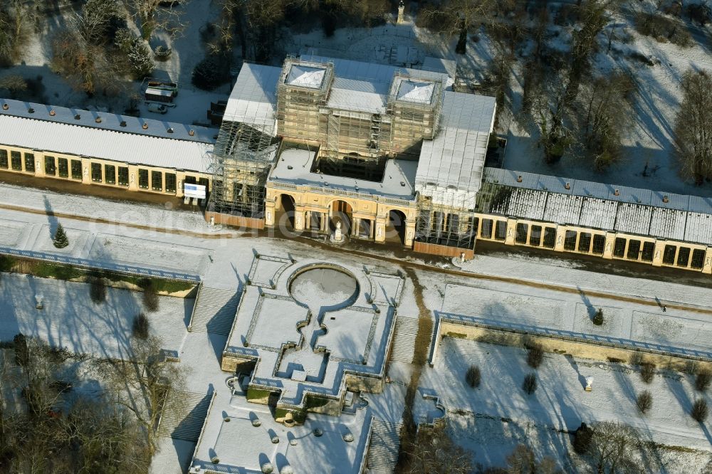 Potsdam from the bird's eye view: Wintry snowy ice Orangery Palace is also known as the New Orangery on the Klausberg in Potsdam in the state Brandenburg