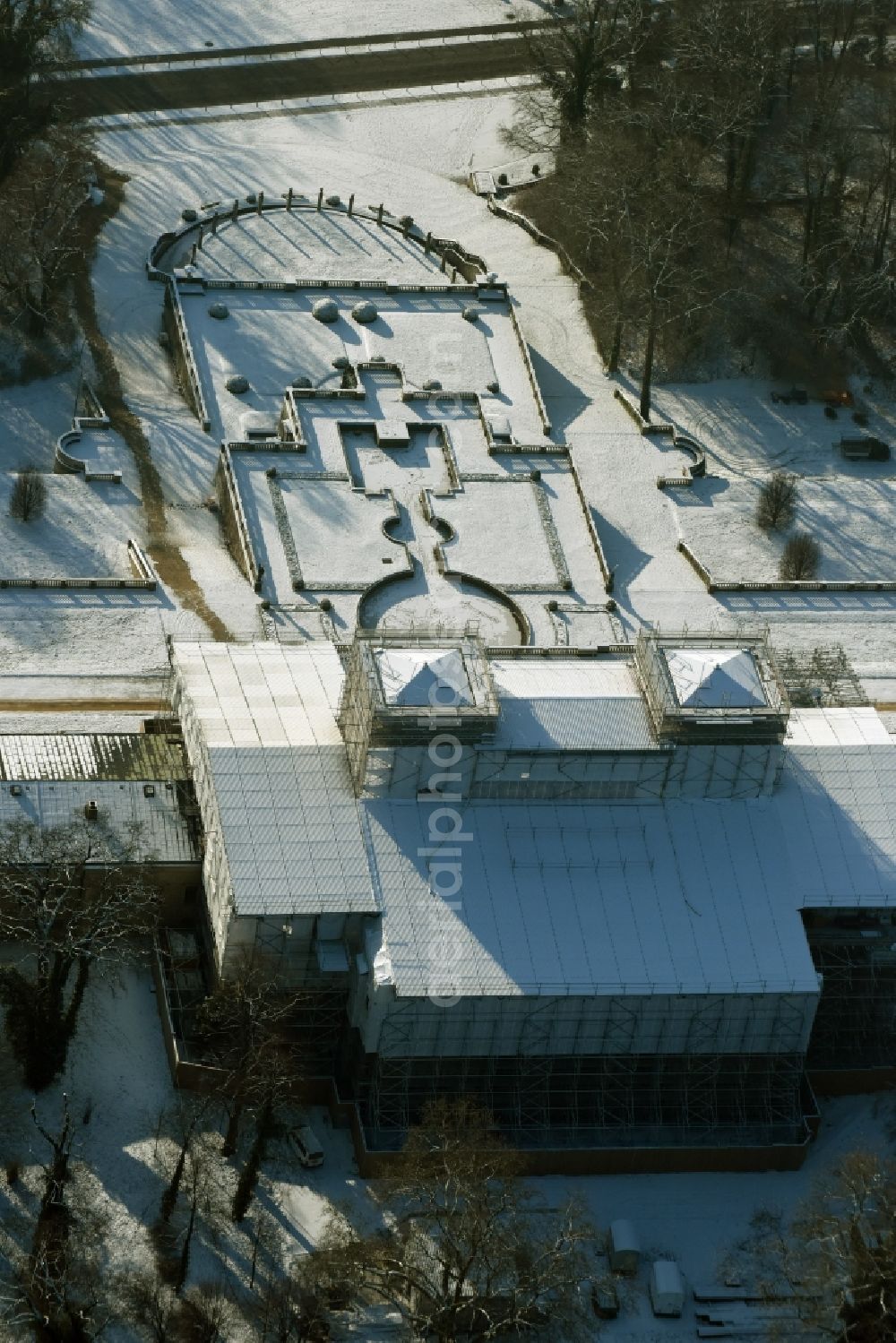 Aerial image Potsdam - Wintry snowy ice Orangery Palace is also known as the New Orangery on the Klausberg in Potsdam in the state Brandenburg