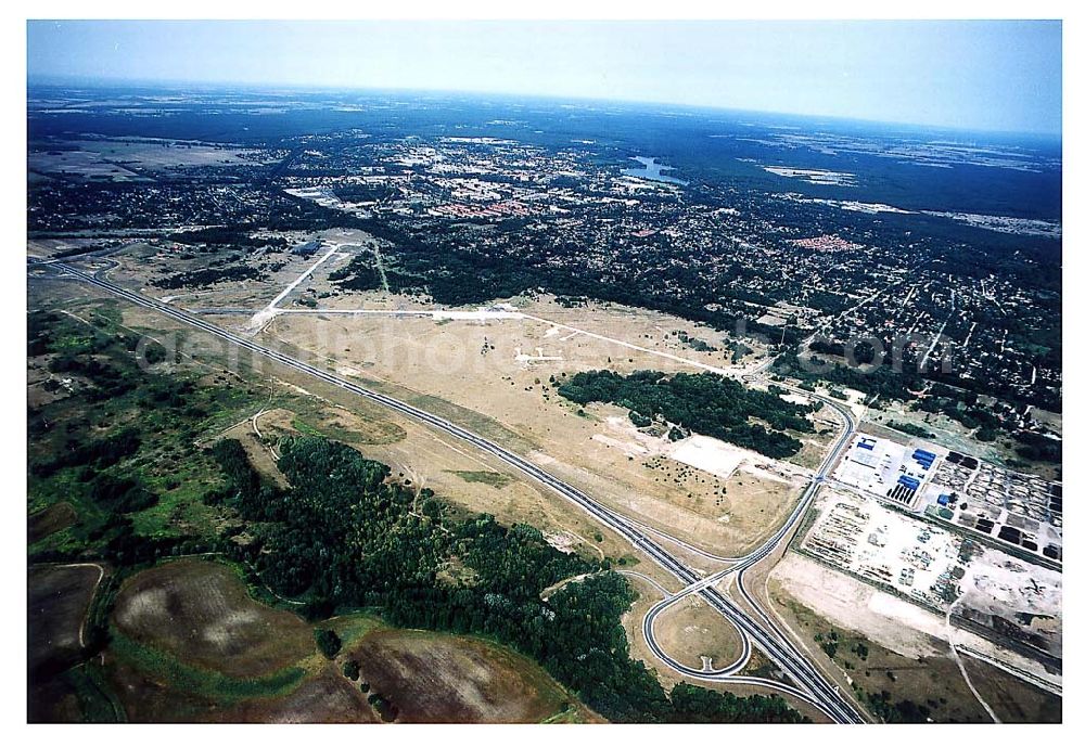 Oranienburg / Brandenburg from the bird's eye view: Oranienburg / Brandenburg ehemaliges Flugplatzgelände umgebaut zum Gewerbepark neben der A10