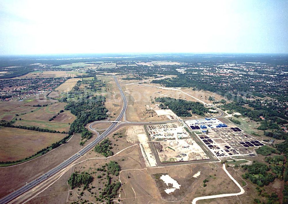 Aerial photograph Oranienburg / Brandenburg - Oranienburg / Brandenburg ehemaliges Flugplatzgelände umgebaut zum Gewerbepark neben der A10