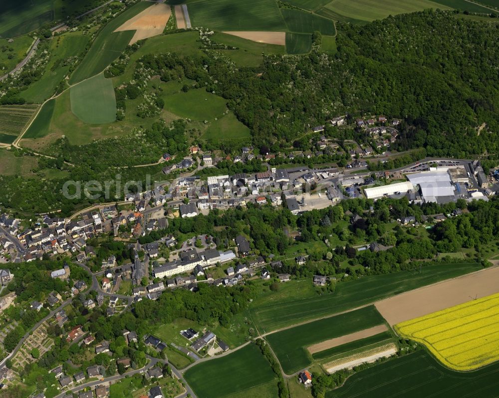 Aerial image Burgbrohl - View of the Luetzingen part of the borough of Burgbrohl in the state of Rhineland-Palatinate.Its residential area is agriculturally informed and surrounded by fields - rapeseed fields - and agricultural land