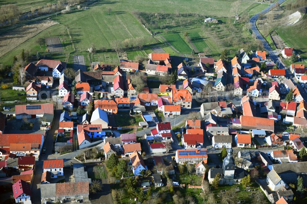 Etzleben from the bird's eye view: Local partial view of the streets and houses of the residential areas in Etzleben in the state Thuringia, Germany