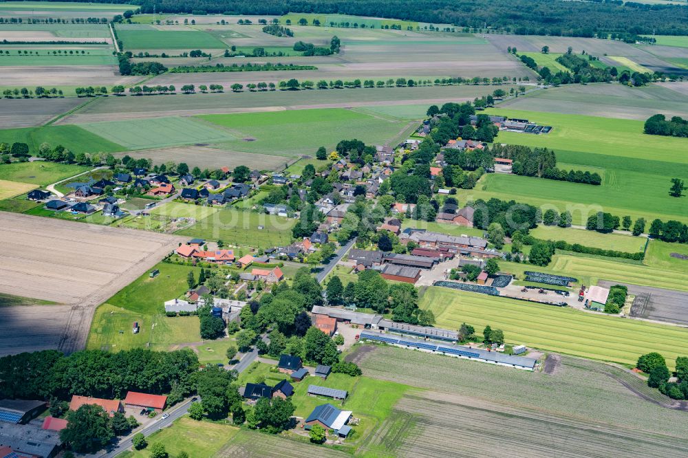 Ahlerstedt from above - Town View of the streets and houses of the residential areas in Ahrensmoor West in the state Lower Saxony, Germany