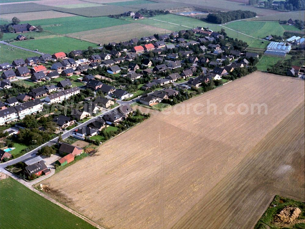 Aerial photograph Alpsray - Town View of the streets and houses of the residential areas in Alpsray in the state North Rhine-Westphalia