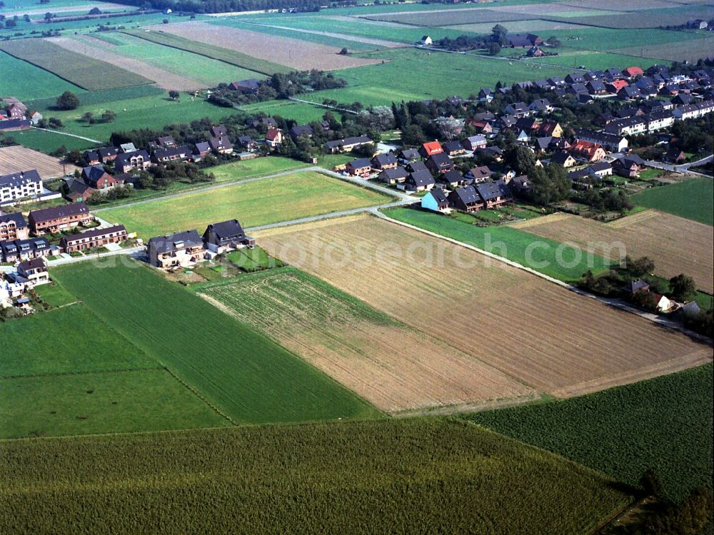 Alpsray from the bird's eye view: Town View of the streets and houses of the residential areas in Alpsray in the state North Rhine-Westphalia