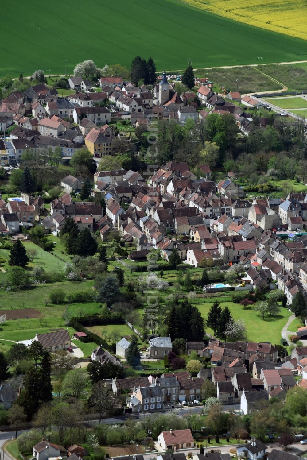 Arcy-sur-Cure from above - Town View of the streets and houses of the residential areas in Arcy-sur-Cure in Bourgogne Franche-Comte, France