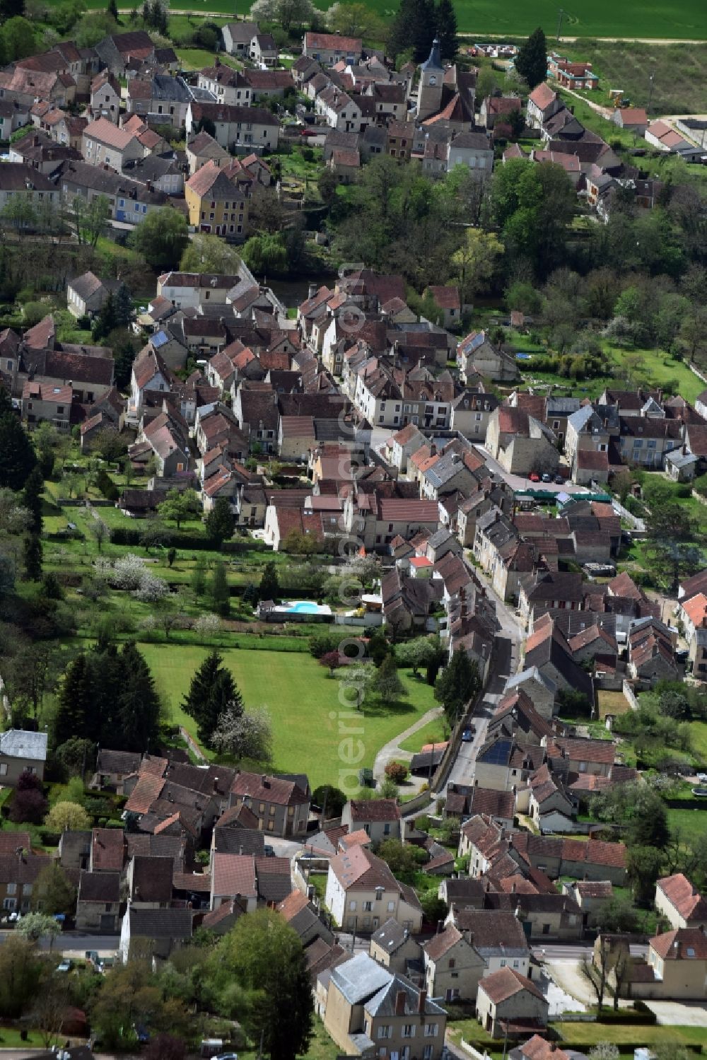 Arcy-sur-Cure from the bird's eye view: Town View of the streets and houses of the residential areas in Arcy-sur-Cure in Bourgogne Franche-Comte, France