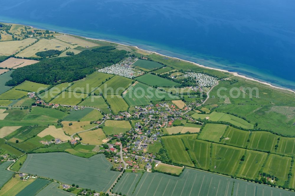 Behrensdorf from above - Town View of the local community Behrensdorf and its camping areas and the shore side of the baltic sea in the state Schleswig-Holstein