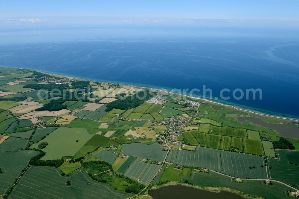 Aerial image Behrensdorf - Town View of the local community Behrensdorf and its camping areas and the shore side of the baltic sea in the state Schleswig-Holstein