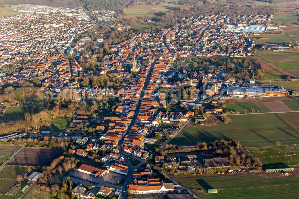 Aerial photograph Bellheim - Town View of the streets and houses of the residential areas on street Hauptstrasse in Bellheim in the state Rhineland-Palatinate, Germany