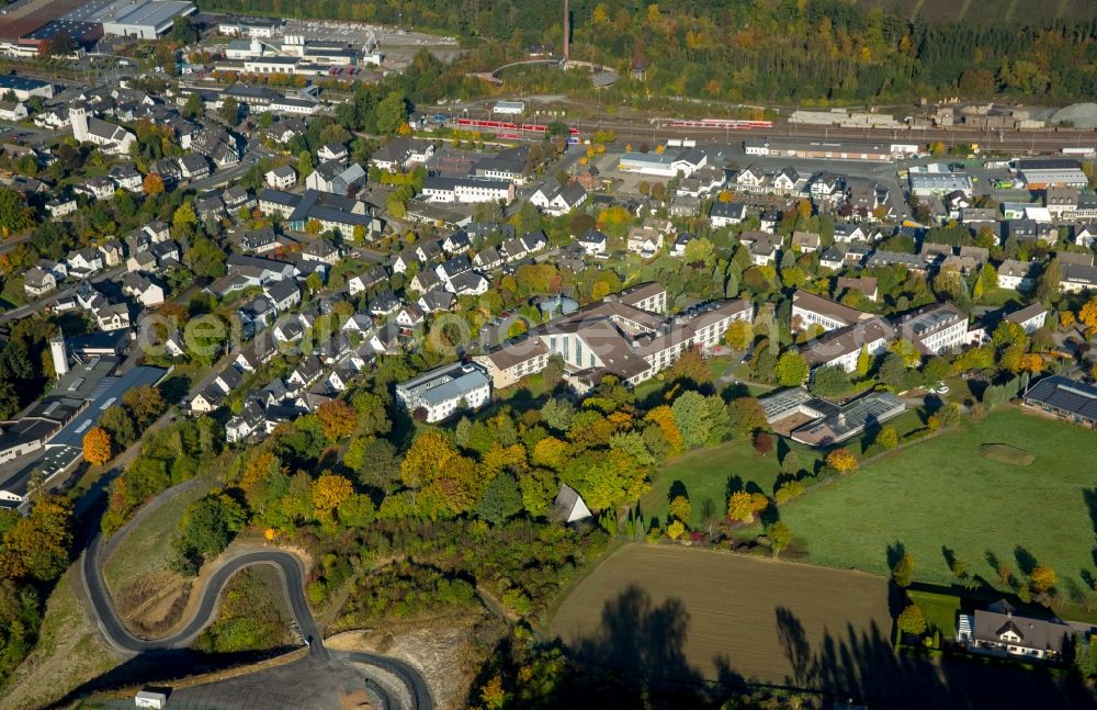 Bestwig from above - Town View of the streets and houses of the residential areas in Bestwig in the state North Rhine-Westphalia. In the picture the convent - nuns of the holy maria magdalena Bestwig