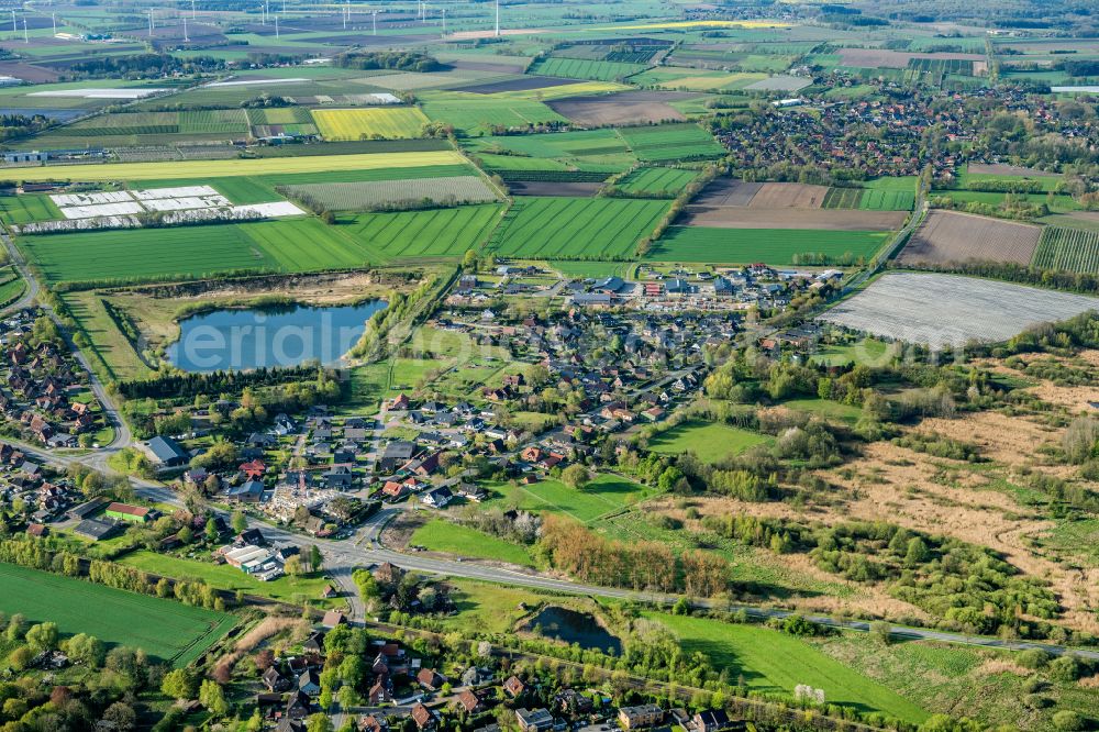 Bliedersdorf from above - City view of the streets and houses of the residential areas in Bliedersdorf Postmoor in the state Lower Saxony, Germany