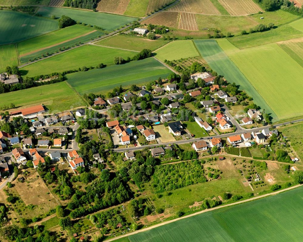 Braunweiler from the bird's eye view: View of Braunweiler in the state of Rhineland-Palatinate. Braunweiler is a borough and municipiality in the county district of Bad Kreuznach. It is located on a hill amidst vineyards. Its elongated shape is widely visible and characteristic