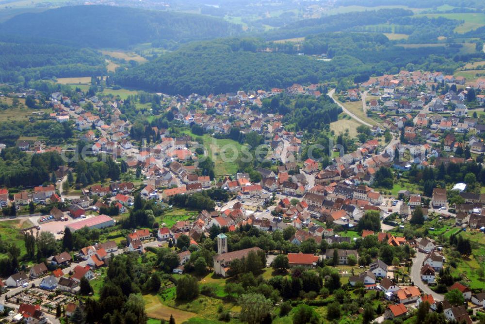 Aerial image Schönenberg-Kübelberg / OT Brücken - Blick auf den Ort Brücken. Brücken ist eine Ortsgemeinde der Verbandsgemeinde Schönenberg-Kübelberg. Brücken, auch Brigge ist tatsächlich an einer Brücke über den Ohmbach errichtet worden. Bekannt ist die Region vor allem für das 1888 gegründete Diamantschleifergewerbe. Kontakt: Ortsgemeinde Brücken, Ortsbürgermeister Toni Guhmann, Glanstr. 24, 66904 Brücken, Tel.: 06386/5422