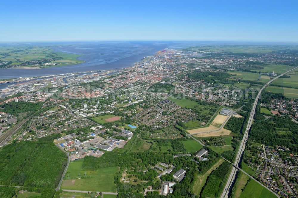 Bremerhaven from the bird's eye view: Town View of the streets and houses of the residential areas in Bremerhaven with mouth of the Weser in the back in the state Bremen