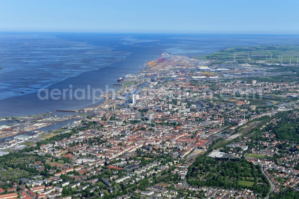 Aerial image Bremerhaven - Town View of the streets and houses of the residential areas in Bremerhaven with mouth of the Weser in the back in the state Bremen