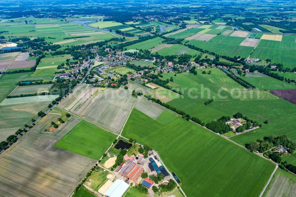 Aerial image Burweg - Town View of the streets and houses of the residential areas in Burweg in the state Lower Saxony, Germany