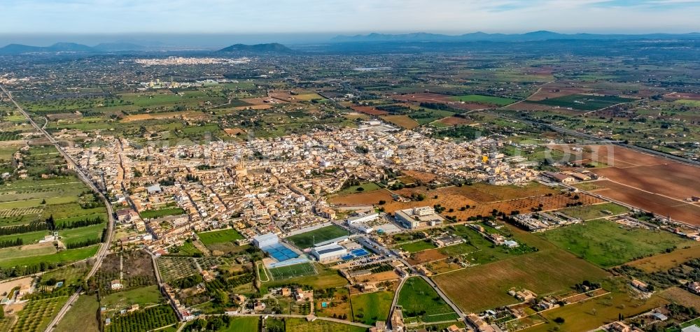 Consell from the bird's eye view: Town View of the streets and houses of the residential areas in Consell in Balearische Insel Mallorca, Spain