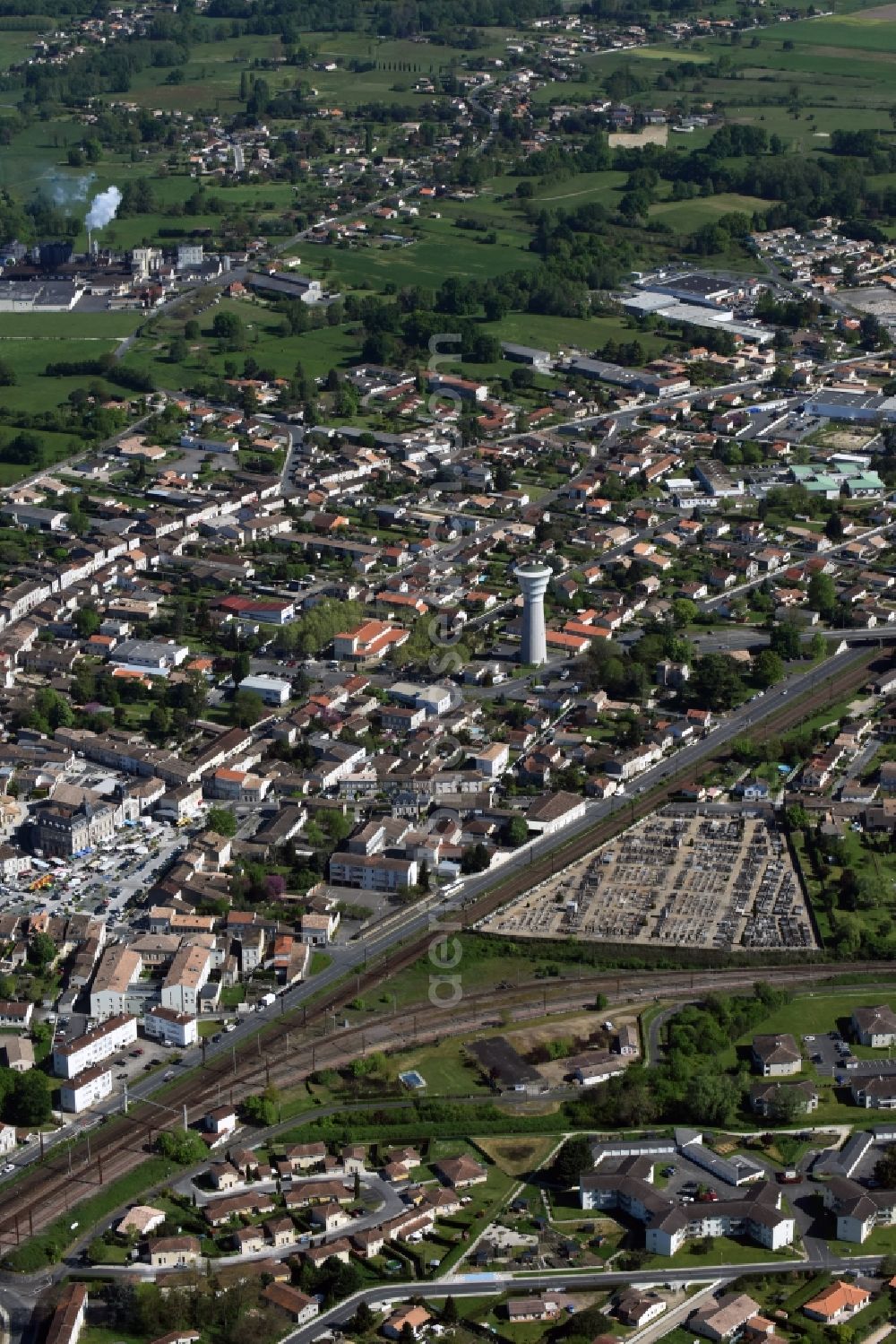 Coutras from above - Town View of the streets and houses of the residential areas in Coutras in Aquitaine Limousin Poitou-Charentes, France